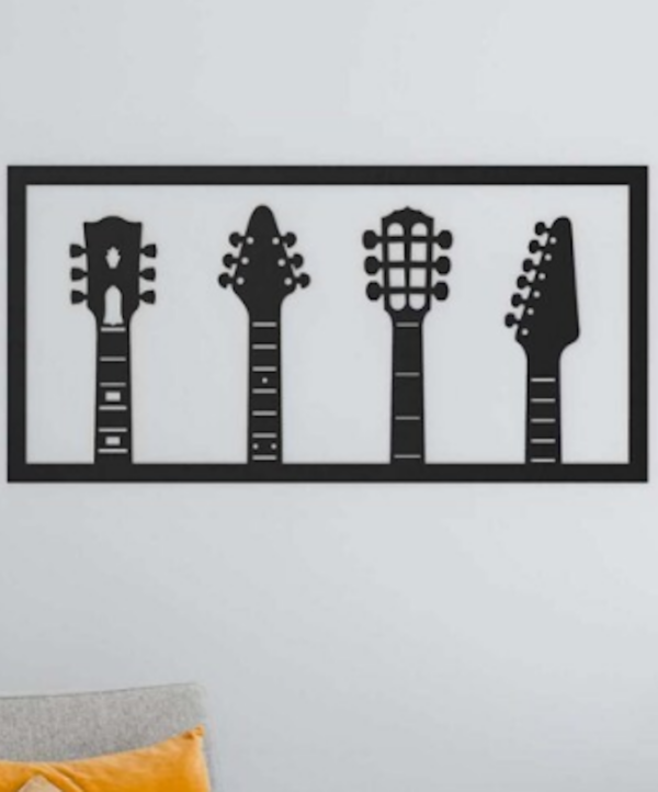 Cuadro troquelado de cuatro mástiles de guitarras